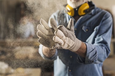 Close-up of dusty work gloves